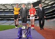 28 April 2009; U21 captains Timmy Hanna, left, Down, and Colm O'Neill, second from right, Cork, with GAA President Christy Cooney, second from left, and Shane Guest, right, Cadbury Senior Brand manager pictured ahead of the Cadbury GAA Football U21 All-Ireland Final to be played in O'Moore Park, Portlaoise, on Monday the 4th of May. Croke Park, Dublin. Picture credit: David Maher / SPORTSFILE