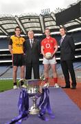 28 April 2009; U21 captains Timmy Hanna, left, Down, and Colm O'Neill, second from right, Cork, with GAA President Christy Cooney, second from left, and Shane Guest, right, Cadbury Senior Brand manager, pictured ahead of the Cadbury GAA Football U21 All-Ireland Final to be played in O'Moore Park, Portlaoise, on Monday the 4th of May. Croke Park, Dublin. Picture credit: David Maher / SPORTSFILE