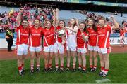 27 September 2015; Cork players, from left, Doireann O’Sullivan, Brid O'Sullivan, Roisin O'Sullivan, Ciara O’Sullivan, Méabh O'Sullivan, Aine Hayes, Jennifer Barry and Maire O'Callaghan with the Brendan Martin cup. TG4 Ladies Football All-Ireland Senior Championship Final, Croke Park, Dublin. Picture credit: Ramsey Cardy / SPORTSFILE