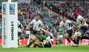 27 September 2015; Darren Cave, Ireland, is tackled by Florin Ionita, Romania. 2015 Rugby World Cup, Pool D, Ireland v Romania, Wembley Stadium, Wembley, London, England. Picture credit: Stephen McCarthy / SPORTSFILE