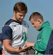 30 September 2015; Ireland's Iain Hendeson has his wrist strapped by Dr. Garrett Coughlan before squad training. 2015 Rugby World Cup, Ireland Rugby Squad Training. Surrey Sports Park, University of Surrey, Guildford, England. Picture credit: Brendan Moran / SPORTSFILE
