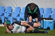30 September 2015; Ireland's  Mike Ross does some warm-up exercises with team physio James Allen during squad training. 2015 Rugby World Cup, Ireland Rugby Squad Training. Surrey Sports Park, University of Surrey, Guildford, England. Picture credit: Brendan Moran / SPORTSFILE