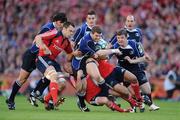 2 May 2009; Gordon D'Arcy, Leinster, is tackled by Niall Ronan, Peter Stringer and Lifeimi Mafi, Munster. Heineken Cup Semi-Final, Munster v Leinster, Croke Park, Dublin. Picture credit: Brendan Moran / SPORTSFILE