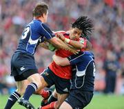 2 May 2009; Lifeimi Mafi, Munster, is tackled by Brian O'Driscoll, left, and Jamie Heaslip, Leinster. Heineken Cup Semi-Final, Munster v Leinster, Croke Park, Dublin. Picture credit: Matt Browne / SPORTSFILE