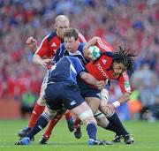 2 May 2009; Lifeimi Mafi, Munster, is tackled by Leo Cullen and Malcolm O'Kelly, Leinster. Heineken Cup Semi-Final, Munster v Leinster, Croke Park, Dublin. Picture credit: Brendan Moran / SPORTSFILE