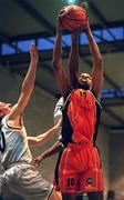 17 December 2000; Jerome Westbrooks of Thorn Killester is checked by Gabe Jackson, hidden, and Gerard Ryan, 10, of Star of the Sea during the ESB Men's Superleague match between Thorn Killester and Star of the Sea at Clontarf in Dublin. Photo by Brendan Moran/Sportsfile