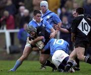 23 December 2000; Rhys Botha of Ballymena is tackled by Killian Keane, 10, and David Wallace of Garryowen during the AIB All-Ireland League Division match between Garryowen and Ballymena at Dooradoyle in Limerick. Photo by Brendan Moran/Sportsfile