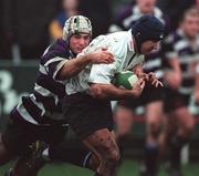 23 December 2000; Luke Hammond of Terenure College RFC is tackled by Craig Taylor of Cork Constitution RFC during the AIB All-Ireland League Division 2 match between Terenure College RFC and Cork Constitution RFC at Lakelands Park in Dublin. Photo by Matt Browne/Sportsfile