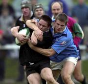 23 December 2000; Ajay Derwin of Ballymena is tackled by Fergus Costello of Garryowen during the AIB All-Ireland League Division match between Garryowen and Ballymena at Dooradoyle in Limerick. Photo by Brendan Moran/Sportsfile