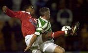 27 December 2000; Tony Cousins of Shamrock Rovers in action against Avery John of Shelbourne during the Eircom League Premier Division match between Shelbourne and Shamrock Rovers at Tolka Park in Dublin. Photo by David Maher/Sportsfile