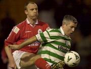 27 December 2000; Tony Cousins of Shamrock Rovers in action against Tony McCarthy of Shelbourne during the Eircom League Premier Division match between Shelbourne and Shamrock Rovers at Tolka Park in Dublin. Photo by David Maher/Sportsfile