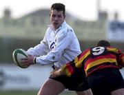 30 December 2000; Brian Walsh of Cork Constitution RFC is tackled by David O'Mahony of Lansdowne RFC during the AIB All-Ireland League Division 1 match between Cork Constitution RFC and Lansdowne RFC at Temple Hill in Cork. Photo by Brendan Moran/Sportsfile