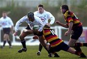 30 December 2000; Ronan O'Donovan of Cork Constitution RFC is tackled by David Quigley of Lansdowne RFC, 10, during the AIB All-Ireland League Division 1 match between Cork Constitution RFC and Lansdowne RFC at Temple Hill in Cork. Photo by Brendan Moran/Sportsfile