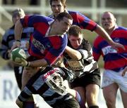 31 December 2000; Dave Moore of Clontarf is tackled by Maurice Lawlor, 12, and Frank Roche of Shannon during the AIB All-Ireland League Division 1 match between Shannon and Clontarf at Thonond Park in Limerick. Photo by Brendan Moran/Sportsfile
