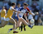 9 June 2013; Darren Hughes of Monaghan in action against Patrick McBride of Antrim during the Ulster GAA Football Senior Championship Quarter-Final match between Antrim and Monaghan at Casement Park in Belfast, Antrim. Photo by Oliver McVeigh/Sportsfile