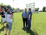 9 June 2013; Aiden Power, from Aviva, interviews Larry Earls, Chairman of Parkville United, during the presentation of the Aviva Club of the Month Award to Parkville United FC at Parkville United A.F.C, Hawkins Lane in Tullow, Carlow. The prestigious award, which is the benchmark for how well Irish football clubs are performing on and off the pitch, is run from October through to May with a different club selected every month as the Aviva Club of the Month, receiving €1,500 to assist in their overall development. Each of the monthly winners then go forward as finalists to the Club of the Year which is chosen at the FAI Festival of Football and AGM. Photo by Matt Browne/Sportsfile