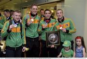 9 June 2013; Team Ireland boxers, from left, Paddy Barnes, silver medal in 49Kg Light Flyweight division, Jason Quigley, gold medal in 75Kg Middleweight division, Michael Conlan, silver medal in 52Kg Flyweight division, and John Joe Nevin, gold medal in 56kg Bantamweight division, on their arrival home from the EUBC European Men's Boxing Championships 2013 in Belarus, at Dublin Airport. Photo by Matt Browne/Sportsfile