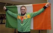 9 June 2013; Ireland's Jason Quigley, who won a gold medal in the 75Kg Middleweight division, on his arrival home from the EUBC European Men's Boxing Championships 2013 in Belarus, at Dublin Airport. Photo by Matt Browne/Sportsfile