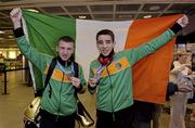 9 June 2013; Ireland's Paddy Barnes, silver medal in 49Kg Light Flyweight division, and Michael Conlan, silver medal in 52Kg Flyweight division, on their arrival home from the EUBC European Men's Boxing Championships 2013 in Belarus, at Dublin Airport. Photo by Matt Browne/Sportsfile
