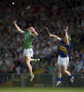 9 June 2013; Paudie O'Brien of Limeirck in action against John O'Dwyer of Tipperary during the Munster GAA Hurling Senior Championship Semi-Final match between Limerick and Tipperary at Gaelic Grounds in Limerick. Photo by Ray McManus/Sportsfile