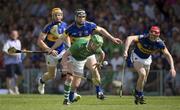 9 June 2013; Seamus Hickey of Limerick in action against Conor O'Mahony, 6, Padriac Maher, left, and Michael Cahill of Tipperary during the Munster GAA Hurling Senior Championship Semi-Final match between Limerick and Tipperary at Gaelic Grounds in Limerick. Photo by Ray McManus/Sportsfile
