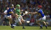 9 June 2013; Seamus Hickey of Limerick in action against Conor O'Mahony, left, and Michael Cahill of Tipperary during the Munster GAA Hurling Senior Championship Semi-Final match between Limerick and Tipperary at Gaelic Grounds in Limerick. Photo by Ray McManus/Sportsfile