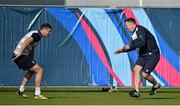 2 October 2015; Ireland's Robbie Henshaw, left, goes through a drill with assistant strength & conditioning coach John Kiely during squad training. Ireland Rugby Squad Training, 2015 Rugby World Cup, Surrey Sports Park, University of Surrey, Guildford, England. Picture credit: Brendan Moran / SPORTSFILE