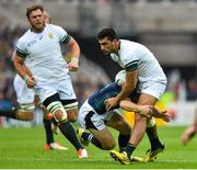 3 October 2015; Damian de Allende, South Africa, is tackled by Greig Laidlaw, Scotland. 2015 Rugby World Cup, Pool B, South Africa v Scotland, St James' Park, Newcastle, England. Picture credit: Ramsey Cardy / SPORTSFILE