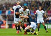 3 October 2015; Lood de Jager, South Africa, is tackled by Blair Cowan, left, and Richie Gray, Scotland . 2015 Rugby World Cup, Pool B, South Africa v Scotland, St James' Park, Newcastle, England. Picture credit: Ramsey Cardy / SPORTSFILE