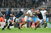 3 October 2015; Handre Pollard, South Africa, is tackled by Blair Cowan, left, and Peter Horne, Scotland. 2015 Rugby World Cup, Pool B, South Africa v Scotland, St James' Park, Newcastle, England. Picture credit: Ramsey Cardy / SPORTSFILE