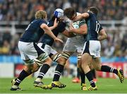 3 October 2015; Lood de Jager, South Africa, is tackled by Blair Cowan, left, and Peter Horne, Scotland. 2015 Rugby World Cup, Pool B, South Africa v Scotland, St James' Park, Newcastle, England. Picture credit: Ramsey Cardy / SPORTSFILE