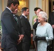 7 May 2009; Her Majesty the Queen meets Denis Leamy and Donncha O'Callaghan, left, at a civic reception for Ireland Rugby Squad on the second day of her visit to Northern Ireland. Hillsborough Castle, Hillsborough, Co. Down. Picture credit: SPORTSFILE/ Niall Carson / PA POOL *** Local Caption *** SPORTSFILE/ Niall Carson / PA POOL