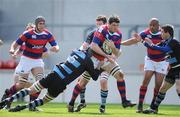 9 May 2009; Simon Crawford, Clontarf, is tackled by David O'Donovan, 15, and Tadhg Bennett, Shannon. AIB League Division 1 Final, Shannon v Clontarf, Thomond Park, Limerick. Picture credit: Brendan Moran / SPORTSFILE