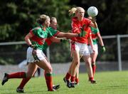 9 May 2009; Nollaig Cleary, Cork, in action against Fiona McHale and Claire Egan, Mayo. Bord Gais Energy Ladies NFL Division 1 Final, Cork v Mayo, St Bridget's GAA Club, Kiltoom, Co Roscommon. Picture credit: Ray McManus / SPORTSFILE