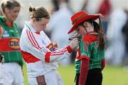 9 May 2009; Mayo supporter Rebecca Brennan, from The Neale, Ballinrobe, has her shirt autographed by goalkeeper Yvonne Byrne after the game. Bord Gais Energy Ladies NFL Division 1 Final, Cork v Mayo, St Bridget's GAA Club, Kiltoom, Co Roscommon. Picture credit: Ray McManus / SPORTSFILE
