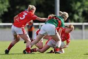 9 May 2009; Deirdre O'Reilly, supporterd by the Cork full-back Angela Walsh comes under pressure from Mayo players Cora Staunton and Claire O'Hara. Bord Gais Energy Ladies NFL Division 1 Final, Cork v Mayo, St Bridget's GAA Club, Kiltoom, Co Roscommon. Picture credit: Ray McManus / SPORTSFILE