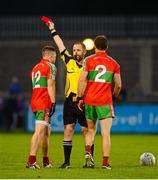 3 October 2015; Karl Connolly, Ballymun Kickhams, is shown the red card by referee David O'Connor for a second yellow card offence. Dublin County Senior Football Championship, Round 2, St Vincent's v Ballymun Kickhams. Parnell Park, Dublin. Picture credit: Piaras Ó Mídheach / SPORTSFILE