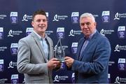 3 October 2015; Wexford full back Liam Ryan is presented with his team of the year award by Bord Gáis Energy Sports Ambassador, Ger Cunningham. during the Bord Gáis Energy U21 Team of the Year 2015. The Marker Hotel, Dublin. Picture credit: Matt Browne / SPORTSFILE