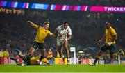 3 October 2015; Anthony Watson, England, beats the tackles of Bernard Foley, left, and Kurtley Beale, Australia, on the way to scoring his side's first try. 2015 Rugby World Cup, Pool A, England v Australia, Twickenham Stadium, London, England. Picture credit: Brendan Moran / SPORTSFILE