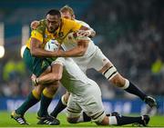 3 October 2015; Sekope Kepu, Australia, is tackled by Geoff Parling and Chris Robshaw, right, England. 2015 Rugby World Cup, Pool A, England v Australia, Twickenham Stadium, London, England. Picture credit: Brendan Moran / SPORTSFILE
