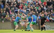 4 October 2015; Peter Nixon, Sean O'Mahony's, in action against Ray Finnegan, Dessie Finnegan and Paddy Keenan, St Patrick's. Louth County Senior Football Championship Final, Sean O'Mahony's v St Patrick's, Gaelic Grounds, Drogheda, Co. Louth. Picture credit: Seb Daly / SPORTSFILE