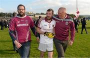 4 October 2015; Slaughtneil captain Francis McEldowney celebrates with Sean McGuigan, Club Chairman, right, and a supporter after the final whistle. Derry County Senior Football Championship Final, Coleraine v Slaughtneil, Celtic Park, Derry. Picture credit: Oliver McVeigh / SPORTSFILE