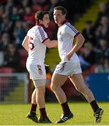 4 October 2015; Se McGuigan, Slaughtneil, right, celebrates with Cormac O'Doherty after scoring his side's goal. Derry County Senior Football Championship Final, Coleraine v Slaughtneil, Celtic Park, Derry. Picture credit: Oliver McVeigh / SPORTSFILE