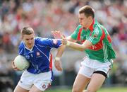 10 May 2009; Dermot Keane, playing for New York but born in Mayo, in action against Barry Moran, Mayo. Connacht Senior Football Championship First Round, New York v Mayo, Gaelic Park, The Bronx, New York, USA. Picture credit: Pat Murphy / SPORTSFILE