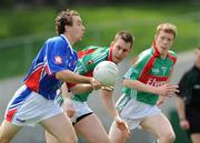 10 May 2009; John McNicholas, New York, in action against Barry Moran and Donal Vaughan, right, Mayo. Connacht Senior Football Championship First Round, New York v Mayo, Gaelic Park, The Bronx, New York, USA. Picture credit: Pat Murphy / SPORTSFILE