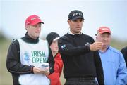 13 May 2009; Padraig Harrington with his caddy Ronan Flood on the 9th tee box during the 3 Irish Open Golf Championship Practice Day, Wednesday. County Louth Golf Club, Baltray, Co. Louth. Picture credit: Matt Browne / SPORTSFILE