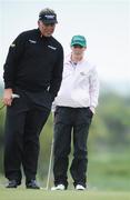 13 May 2009; Darren Clarke lines up a putt for sixteen-year-old Sarah Helly, from Enniscrone Golf Club, Co. Sligo, on the 1st green during the 3 Irish Open Golf Championship Practice Day, Wednesday. County Louth Golf Club, Baltray, Co. Louth. Picture credit: Matt Browne / SPORTSFILE