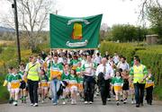 10 May 2009; Members of Carricmore GFC, Co. Tyrone, patricipate in a parade as part of Lá na gClub activities as GAA clubs around the country celebrate the Anniversary with games and commemorative events in their local communities. Clubs have been encouraged to celebrate the GAA’s century and a quarter anniversary by organising events within their communities which underline their importance and special contribution to their respective areas. Picture credit: Oliver McVeigh/ SPORTSFILE  *** Local Caption ***