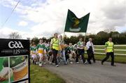 10 May 2009; Members of Carricmore GFC, Co. Tyrone, patricipate in a parade as part of Lá na gClub activities as GAA clubs around the country celebrate the Anniversary with games and commemorative events in their local communities. Clubs have been encouraged to celebrate the GAA’s century and a quarter anniversary by organising events within their communities which underline their importance and special contribution to their respective areas. Picture credit: Oliver McVeigh/ SPORTSFILE  *** Local Caption ***