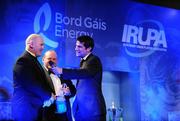 6 May 2009; Ger Earls, father of Keith Earls, being interviewed by MC Craig Doyle, in the company of Andrew Burke of Nature Valley, at the Bord Gais Energy IRUPA Rugby Player Awards. Burlington Hotel, Dublin. Picture credit: Brendan Moran / SPORTSFILE